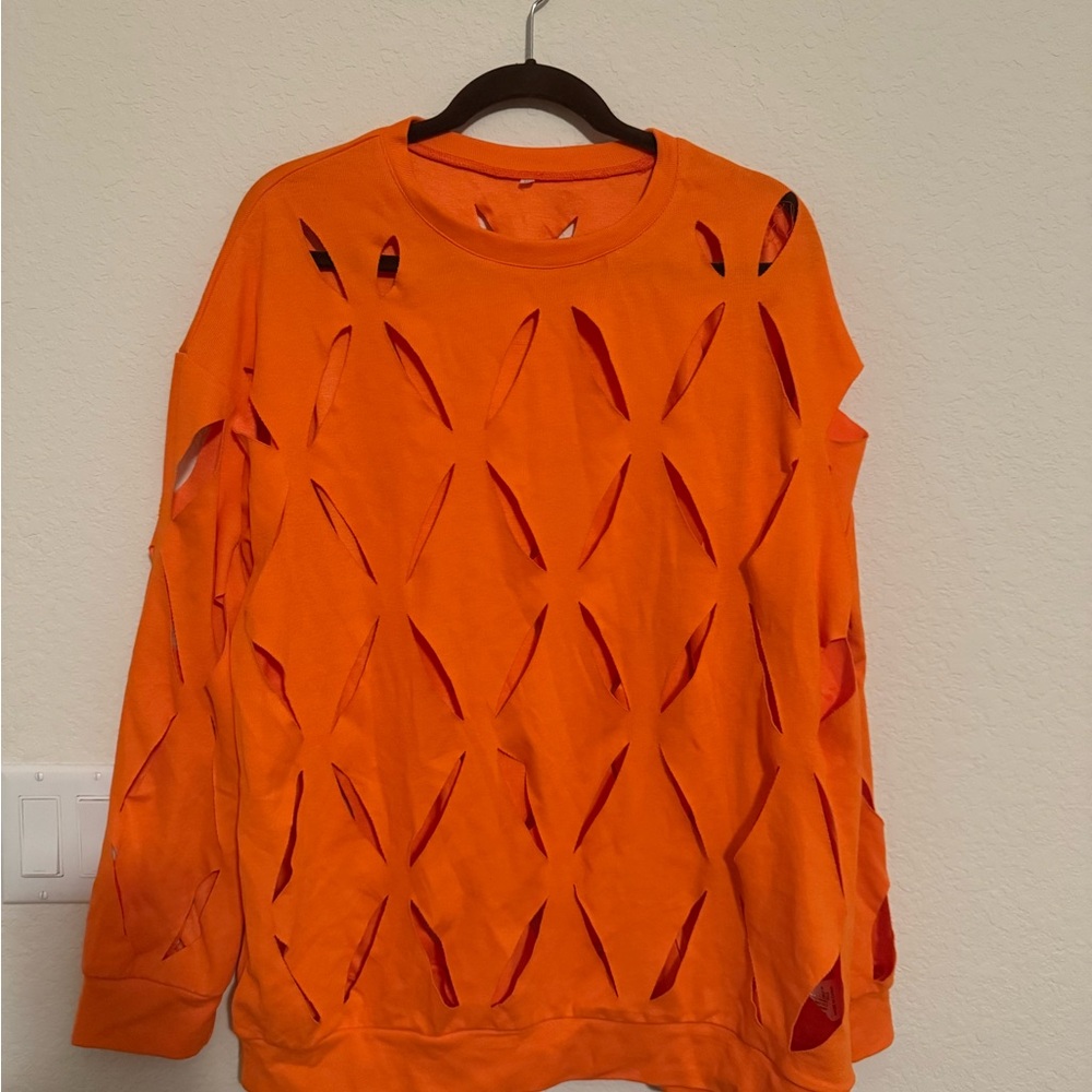 Orange cut out sweatshirt